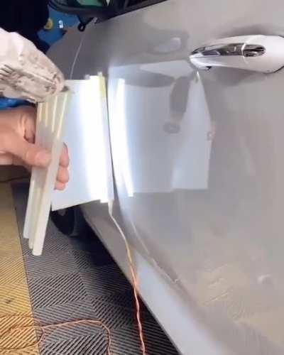 Using hot glue to fix dents in cars!