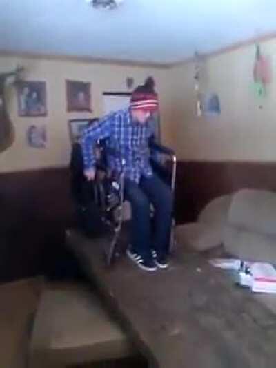 Wheelchairing down a ramp in an abandoned trailer