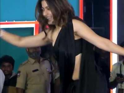 Rashmika Mandanna Bending Down to Dance but My Eyes are Fixated in her Right Tit which is trying hard to come out of Blouse while Navel Peeking through Saree. Missing Behind shot of this one as her Twerking Ass would be a Delight to Watch