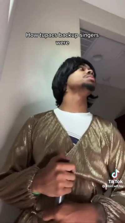 Being a backup singer for Tupac