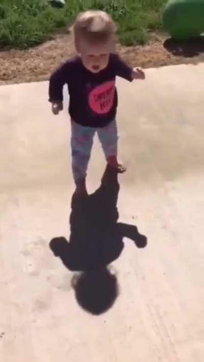Kid scared of its own shadow