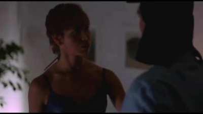 Kim Kopf Seduces a Man Only to Knee Him in the Balls in Prison Planet (1992)