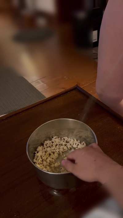 Flavoring his popcorn 🍑💦🍿