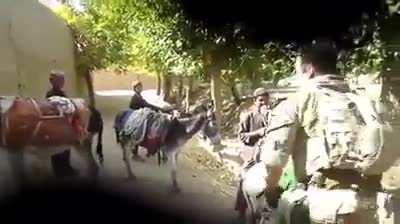 American soldier humiliating Afghan children . You will not see any of those Afghans who support PTM in Pakistan , protesting against this abuse .