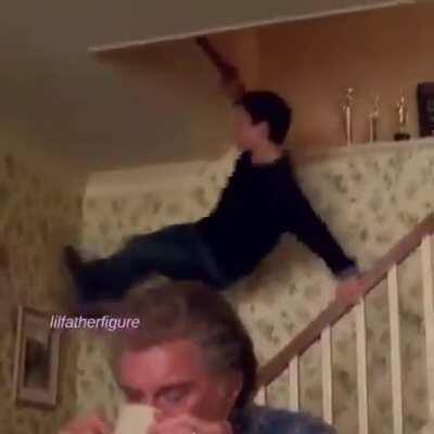 Peter Parker (a.k.a. Spiderman) running down the stairs
