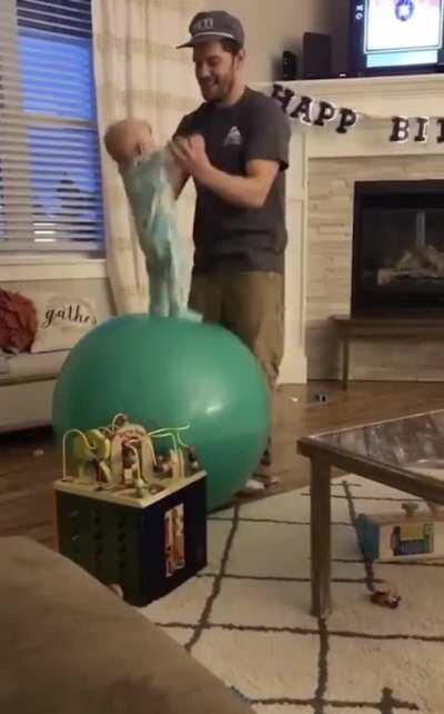 It's so cute seeing a dad playing with his baby