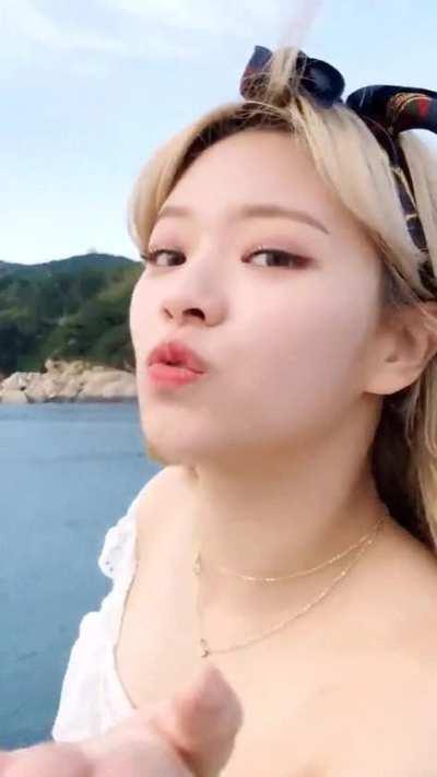 Jeongyeon - blonde, blue head bandana, white top, boat