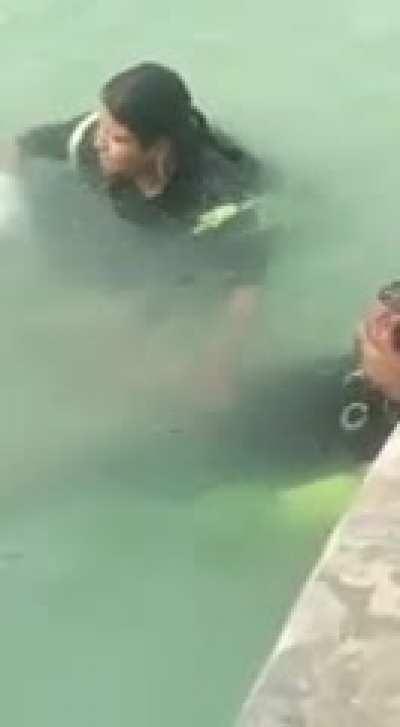 getting jerked off by his wife in a public pool