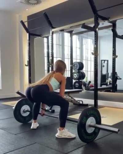 She squats