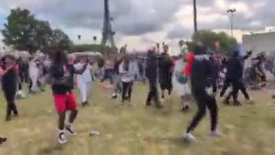 People in Paris attacking the police after the PSG football victory