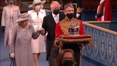 BBC's comments on North Korea overlaid on Lizzy's funeral procession