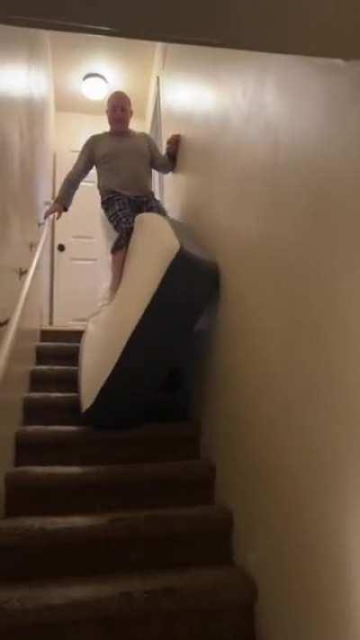 Riding a mattress down the stairs