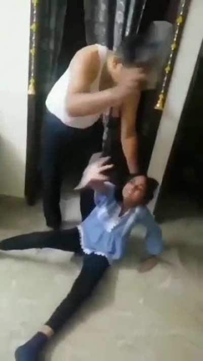 Father beating daughter for instagram chatting