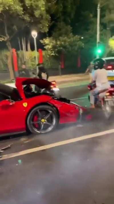 Jakarta, Indonesia: Ferrari crash into bunch of motorcycles and taxi, no visible injury at the moment