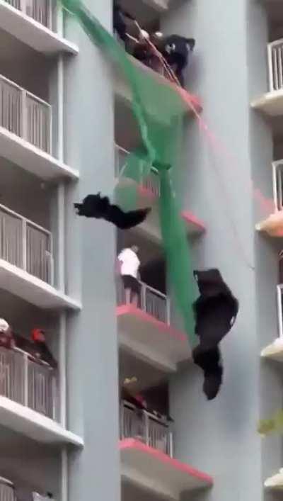 Residents applaud as SCDF officers rescue woman, 74, from parapet of Bukit Batok block