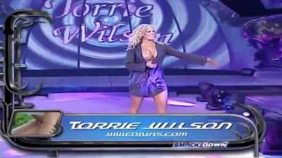 Michael Cole & Tazz's dual response to seeing Torrie coming out, during her entrance for the 