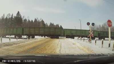 Train Crashes into Car on Tracks