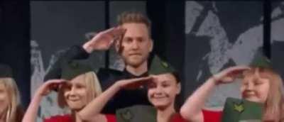 Realizing That It Is A Wrong Place To Do This Salute