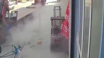 Woman carrying infant strolls through construction hazards 😨