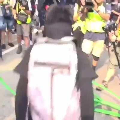 Protestors In Hong Kong Cutting Down Facial Recognition Towers.