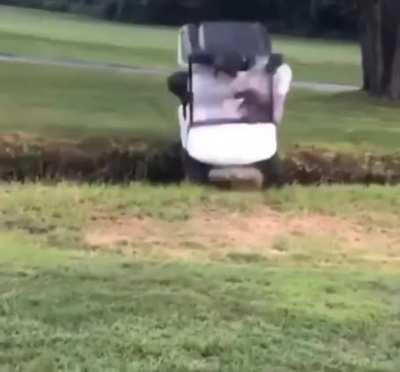 Attempting a jump with a golf cart