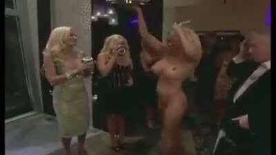 Pamela Anderson showing up fully nude to Hugh Hefner's birthday party