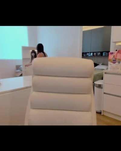 Aria in short shorts and tank top