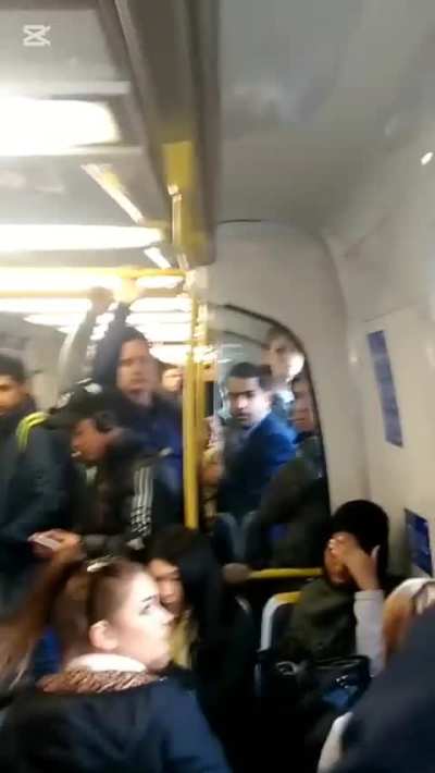Girl on train gets told to turn her loud music down and then kicks off when she sees she's being recorded