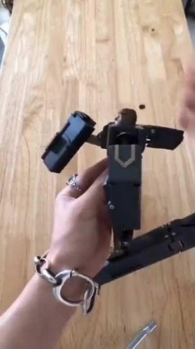 It looks like it might be 3D printed, if so I will go to the ends of the earth for the STL.