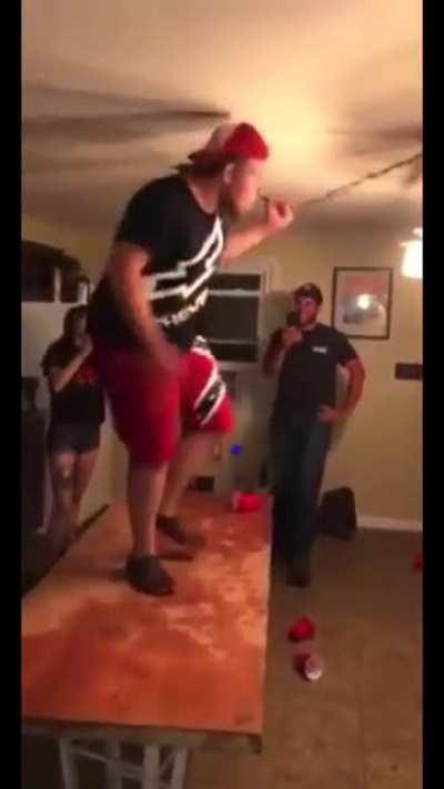 Hold my beer while I dance on a table holding electric wires