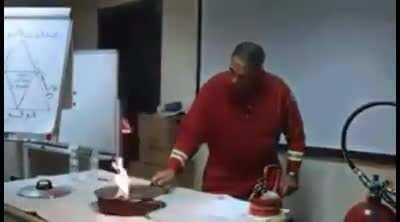 Firefighter demonstrates how to put out a kitchen fire