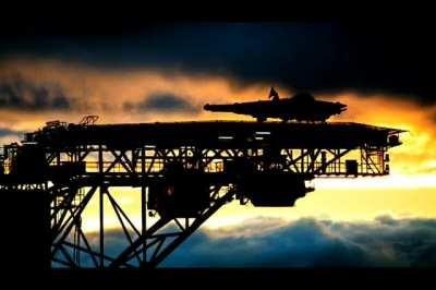 I took a photo of part of an oil rig and photoshopped in the Falcon and animated the clouds