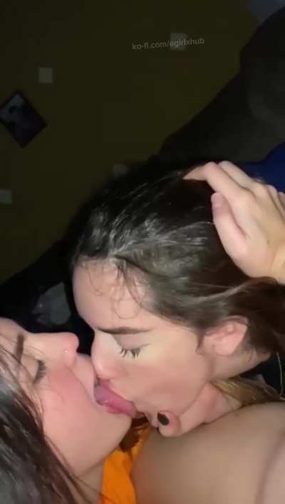 Girls making out while their friend films