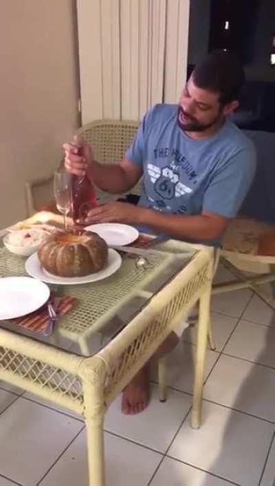 Still confident enough to pour the alcohol in his glass