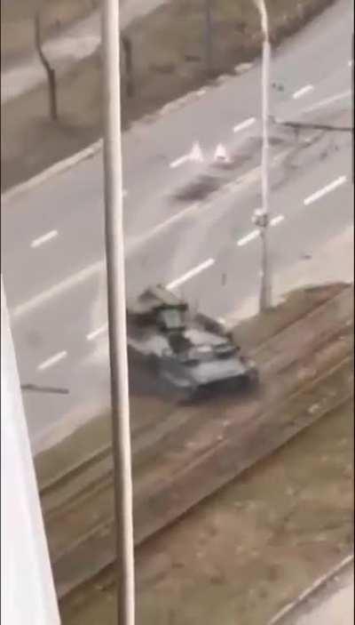 Civilian car getting crushed. Assuming this is what happened to the guy in a previous post who was trapped in a crushed car. I'd say Russian but unsure