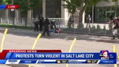 Salt Lake City cop pushes old man with cane to the ground