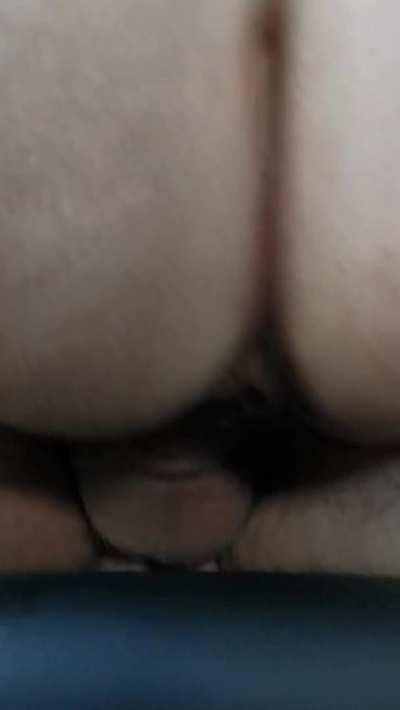 in the backseat draining some balls while hubby watches