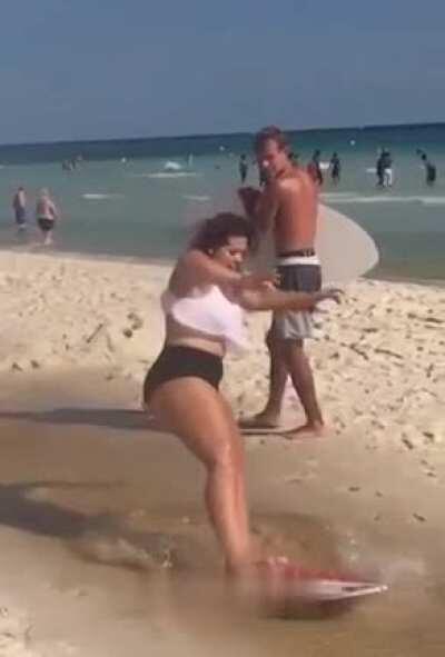 Wcgw jumping on a moving surfboard.