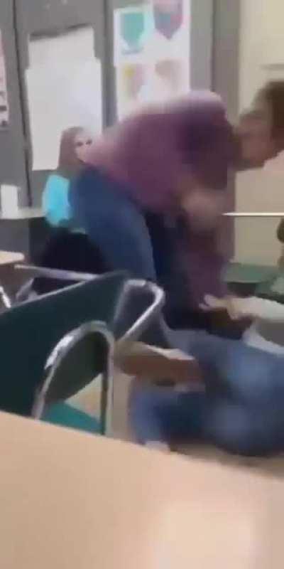 The girl on the ground was mocking the girl on tops glasses of so she decided she was done with her BS