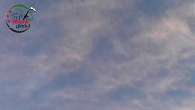 FSA Northern Storm Brigade fighters engaging an SAA helicopter with AA are targeted by incoming - Aleppo Countryside - 12/29/2012