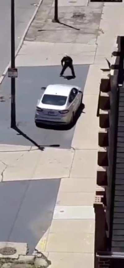 Guy throwing rocks at cars gets what he deserves.