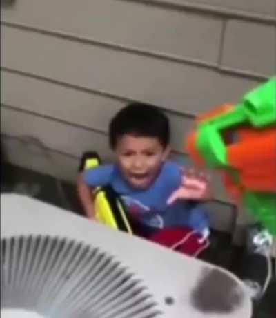 Kid gets shot by a nerf gun while Komm, Susser Tod plays