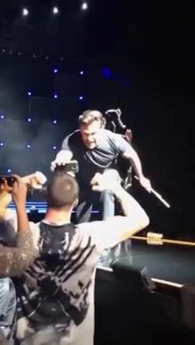 Hugh Jackman getting a fan fired up!