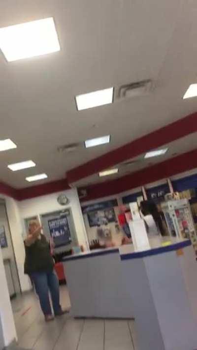 Woman tries to publicly exorcise man for telling her to wear a mask.