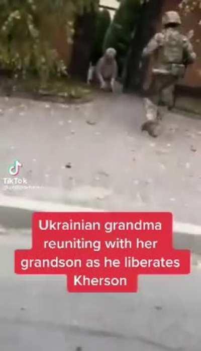 Man embraces his grandmother after liberating Kherson