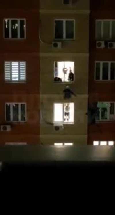 A police officer from a special unit pushed a girl who was planning to commit suicide back in to her apartment