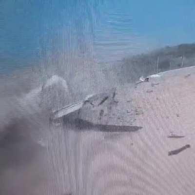 (11 July 2023) Security camera video captures an Embraer EMB 120 crashing into a fence while landing in Mogadishu