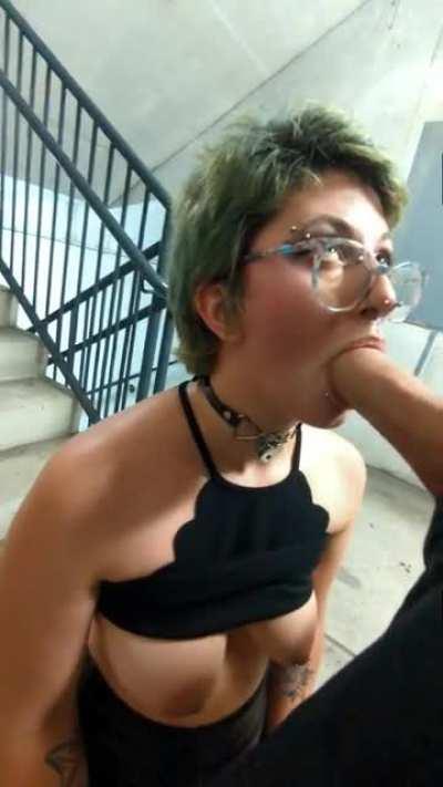 Another angle of the sneaky parking garage stairs blowjob