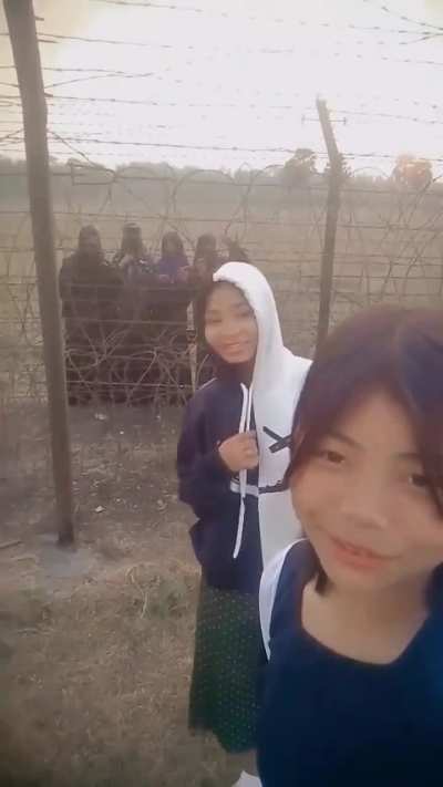 Don't these kanglus have any shame, hanging on the border fence like dogs.