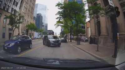 Idiot tries to use oncoming traffic lane to skip the line of people turning left.